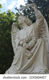 Sculpture Of Angel Holding Laurel Wreath And Olive Branch