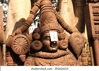 Sculpture of Balaji created through woodern carving