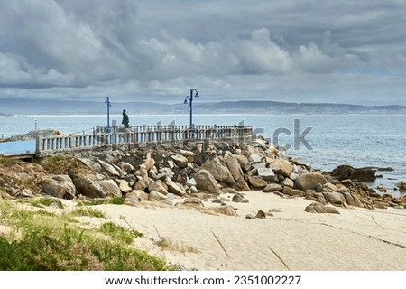 Sculpture dedicated to Galician women on a promontory over the sea Foto stock © 