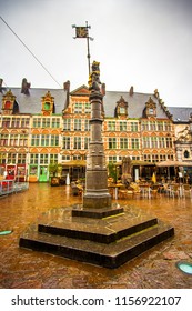 The sculpture of Flemish lion, holding the Coat of Arms at Sint Veerleplein square in the historic city center of Ghent (Gent), Belgium