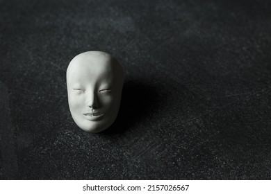 Sculpture Head, Paper Clay Doll On Dark Background