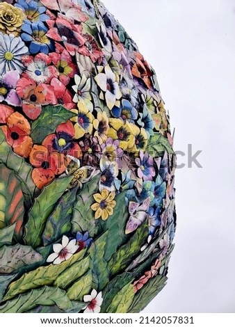Sculpture of a hot air balloon decorated with flowers