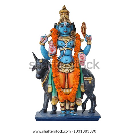 Sculpture of Lord Vishnu with cow isolated on white background. The four-armed form of Vishnu with a garland of real flowers.