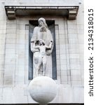 The sculpture on the exterior of the BBC headquarters, located on Portland Place and Langham Place in London, UK. The statue by Eric Gill has sparked debate due to the sculptors alleged sordid past.