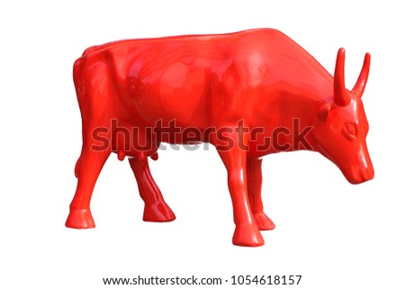 
Sculpture of a red cow on an isolated background