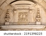 A sculpture relief of Santa Engracia, on the exterior of the Church of Santa Engracia, also known as the National Pantheon in Lisbon, Portugal.