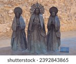 Sculpture of the Three Marias outside the Basilica of Santa Maria in Elche. Alicante, Spain.