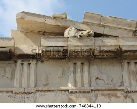 Sculptures in the pediment of the Parthenon at the Acropolis in Athens, Greece