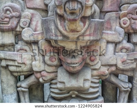 sculptures of pre hispanic Mexican and Aztec Mayan cultures, made in stone with reliefs and figures of the ancient settlers, positions of war and praise to the millenary Mexican gods