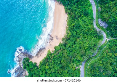 Sea Aerial View,Top View,amazing Nature Background.The Color Of The Water And Beautifully Bright.Azure Beach With Rocky Mountains And Clear Water Of Thailand Ocean At Sunny Day.Winding Road. 