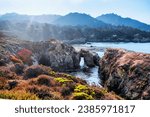 Sea arch on the rocky coastline at Point Lobos State Natural Reserve, in California. Travel concept, nature protection