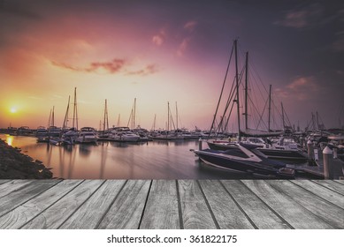 Sea bay with yachts on wooden floor.For product display - Powered by Shutterstock