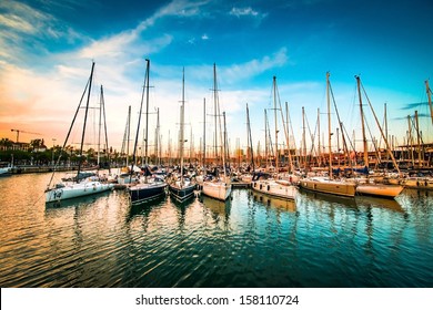 Sea bay with yachts at sunset - Shutterstock ID 158110724