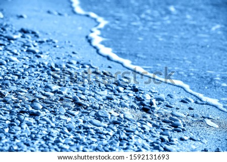 Similar – Lots of colorful stones on the beach