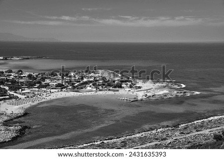 The sea and the beach from a bird's eye view in Stavros
 on the island of Crete, Greece,  monochrome