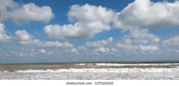 sea beach with clouds