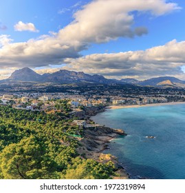 Sea beach forest mountains and clouds with blue sky. Wide landscape view. Scenic view. Square ratio 