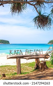 Sea beach with an inscription from the knots of trees Kata beach in Thailand on the island of Phuket. Travel and tourism.