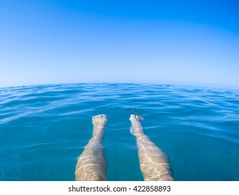 Sea Blue View From First Person With Legs