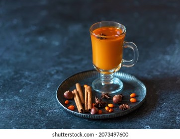 Sea Buckthorn Tea In A Glass. Hot Drink In Winter. Vitamin Beverage. 