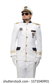 The sea captain in a white suit and sunglasses slightly turned his head to the side, isolated on a white background, plan photo - to the knees.