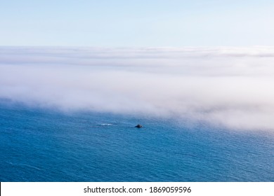 A Sea Of Cloud Covers The Pacific Ocean To Create An Abstract And Minimal Landscape In Big Sur, California