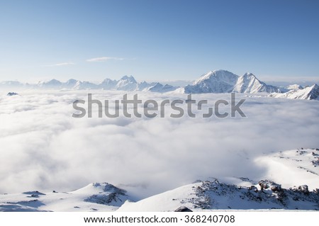 Sea of clouds on the slopes of mount Elbrus