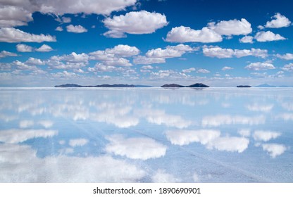 A sea of clouds reflected in Uyuni salt flat, Bolivia - Powered by Shutterstock