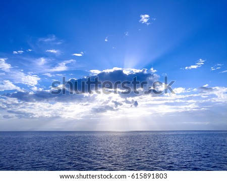 Sea, Clouds and Sun Rays