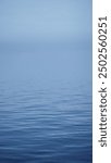 Sea fog calm water waves misty ocean texture abstract natural pattern vertical background