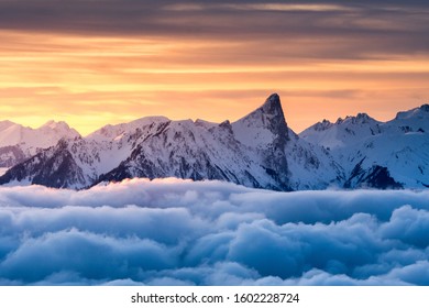 sea of fog in front of Mount Stockhorn at a winter sunset - Shutterstock ID 1602228724