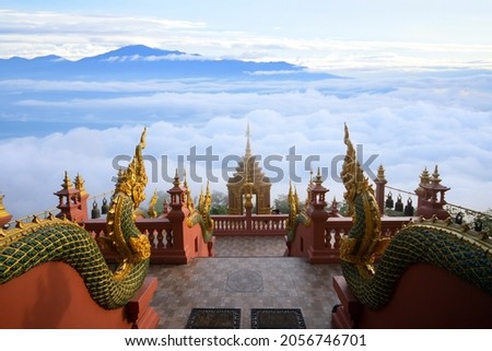 Sea of fog landscape under cloudy blue sky from Wat Phra That Doi Phra Chan in Lampang, the north of thailand