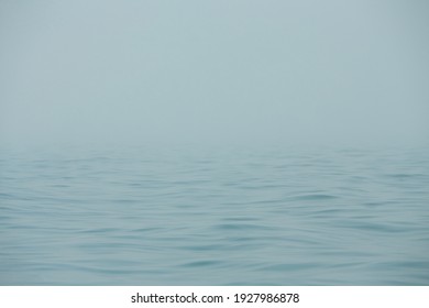The sea in the fog. The line of the horizon, dissolving in the fog. Irish sea in fog. Foggy weather 