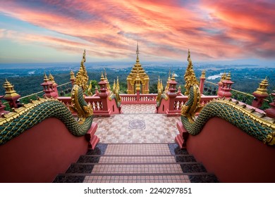 Sea of fog and sunrise sky at Wat Phra That Doi Phra Chan on the top hill of Doi Phra Chan mountain in Mae Tha, Lampang province, Thailand - Shutterstock ID 2240297851