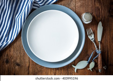 Sea Food Place Setting On Wooden Table With Copy Space. Menu Card For Restaurants