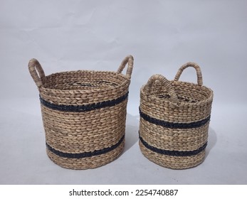 Sea grass Bead Baskets featuring decorative, natural colour beads around the rim. Handwoven from sustainably farmed sea grass.  Great for storage or an ornamental piece around the home. - Shutterstock ID 2254740887
