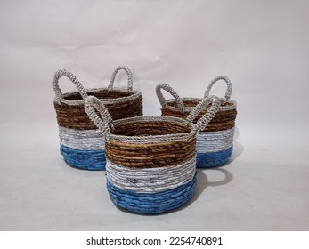 Sea grass Bead Baskets featuring decorative, natural colour beads around the rim. Handwoven from sustainably farmed sea grass.  Great for storage or an ornamental piece around the home. - Shutterstock ID 2254740891