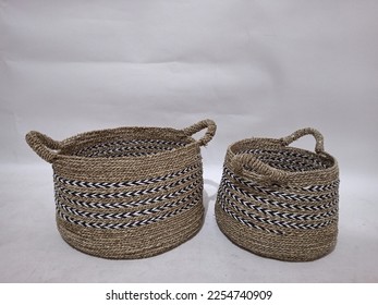 Sea grass Bead Baskets featuring decorative, natural colour beads around the rim. Handwoven from sustainably farmed sea grass.  Great for storage or an ornamental piece around the home. - Shutterstock ID 2254740909
