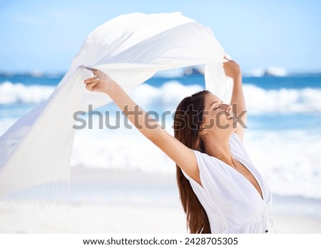 Sea, happy woman and fabric in wind at beach outdoor for summer, vacation and travel on holiday. Ocean, smile and person fly with silk sarong in the air for adventure, freedom or calm breeze by water