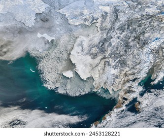 Sea ice off western Alaska. Sea ice off western Alaska. Elements of this image furnished by NASA. - Powered by Shutterstock