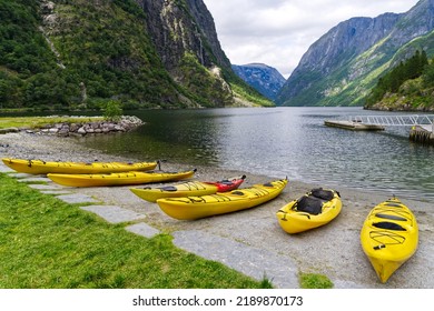 Sea Kayak (touring Kayak) In A Fjord In Norway, Scandinavia Pulled Ashore