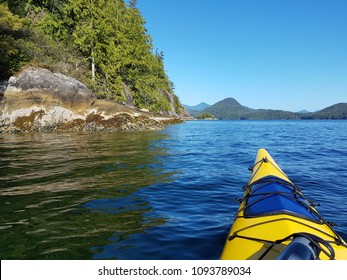 Sea kayaking on a brilliant, sunny day on the Clayoquot Sound near Tofino, BC