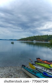 Sea Kayaks On A Beach Near Salt Spring Island