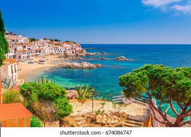 Sea landscape with Calella de Palafrugell, Catalonia, Spain near of Barcelona. Scenic fisherman village with nice sand beach and clear blue water in nice bay. Famous tourist destination in Costa Brava - Shutterstock ID 674086747