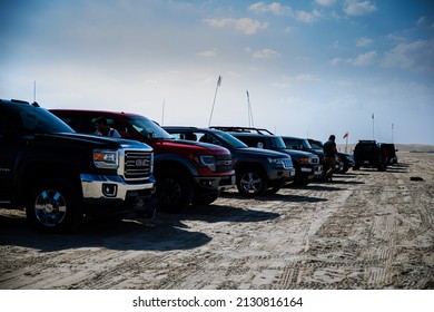 Sea Line Sand Dunes, Qatar, Circa 2021: Convoy Of Sports Utility Vehicles (SUV) Ready For Desert Driving. Dune Bashing Is Favorite Sport In Qatar.