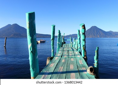 Sea Magic In Guatemala: Lake Atitlán In Central America. In The Background The Volcanoes Tolimán, Atitlán And San Pedro. 