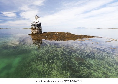 Sea Mark, Stone Cairn, On Skerry On Still Summer Day In Helgeland Archipelago, Norway. 