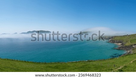 Sea mist and fog out to great basket island near Dunquin pier via Slea Head Drive on Dingle Peninsula on the Wild Atlantic Way in Kerry on the west coast of Ireland.  