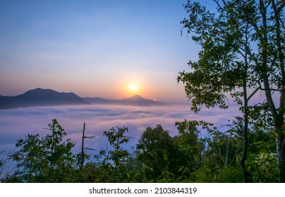 sea of ​​mist in the morning with sunrise. sea of fog over the mountain. Beautiful dramatic view. - Shutterstock ID 2103844319