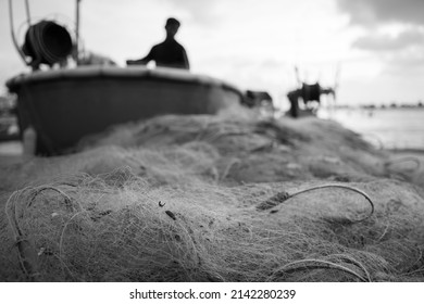 Sea nets - fishing equipment or tackle as texture backdrop with natural sunlight and shadow. Black and white textured background of fishing nets close-up, marine design for craft of fishermen. - Powered by Shutterstock